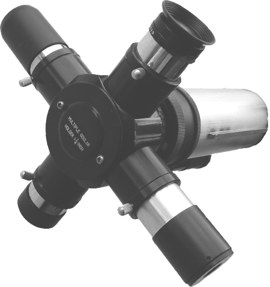 Bild, dass einen Okularrevolver mit vier Okularen zeigt